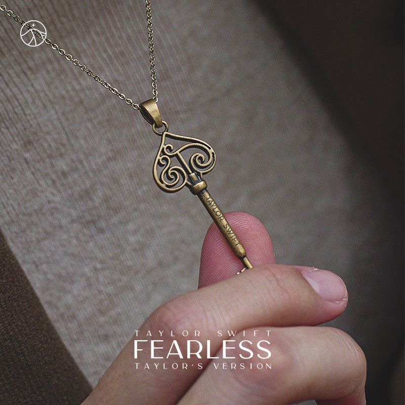 Fearless Taylor Swift inspired key necklace in plated copper, 4.5 cm long with chain, ideal for Swiftie fans.